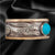 FREYJA'S HARES SOLITAIRE BAND RING with TURQUOISE CABACHON 10KT 2-TONE GOLD