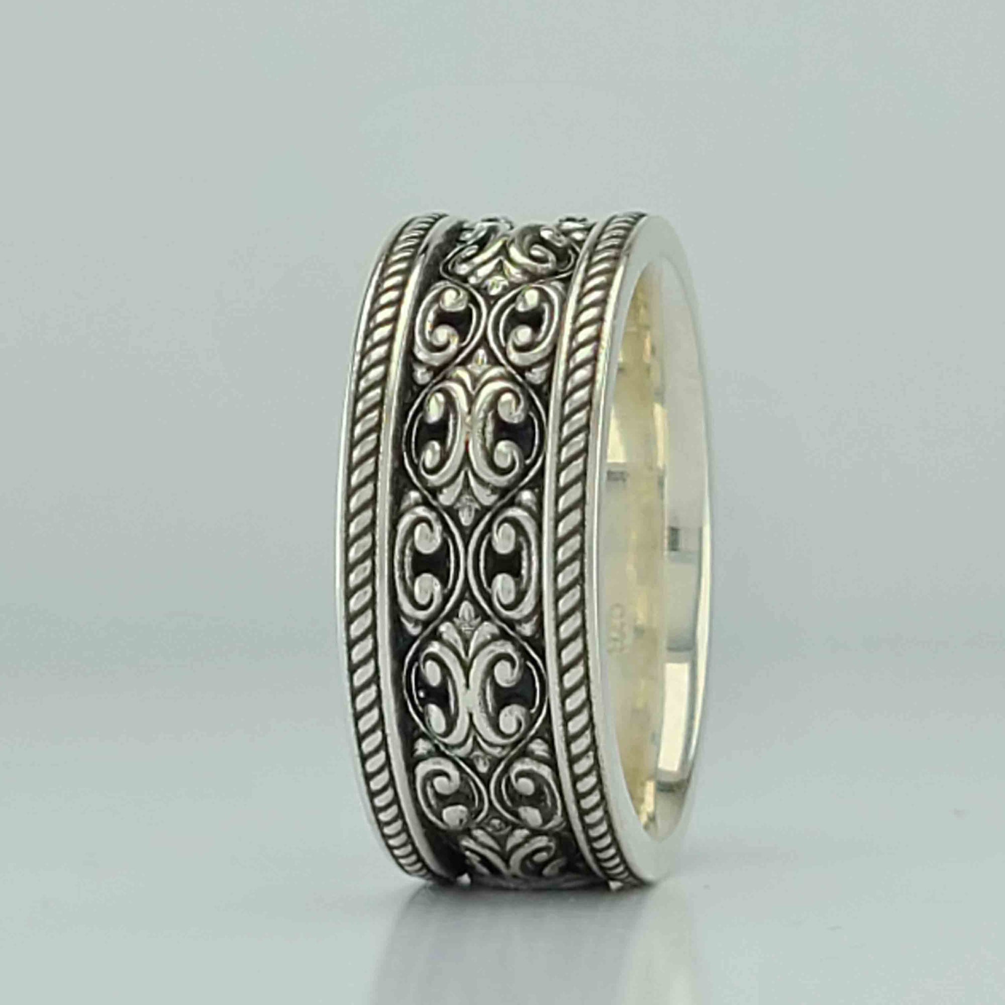 QUATRE CARRERES - ELEGANT SCROLL WEDDING RING
