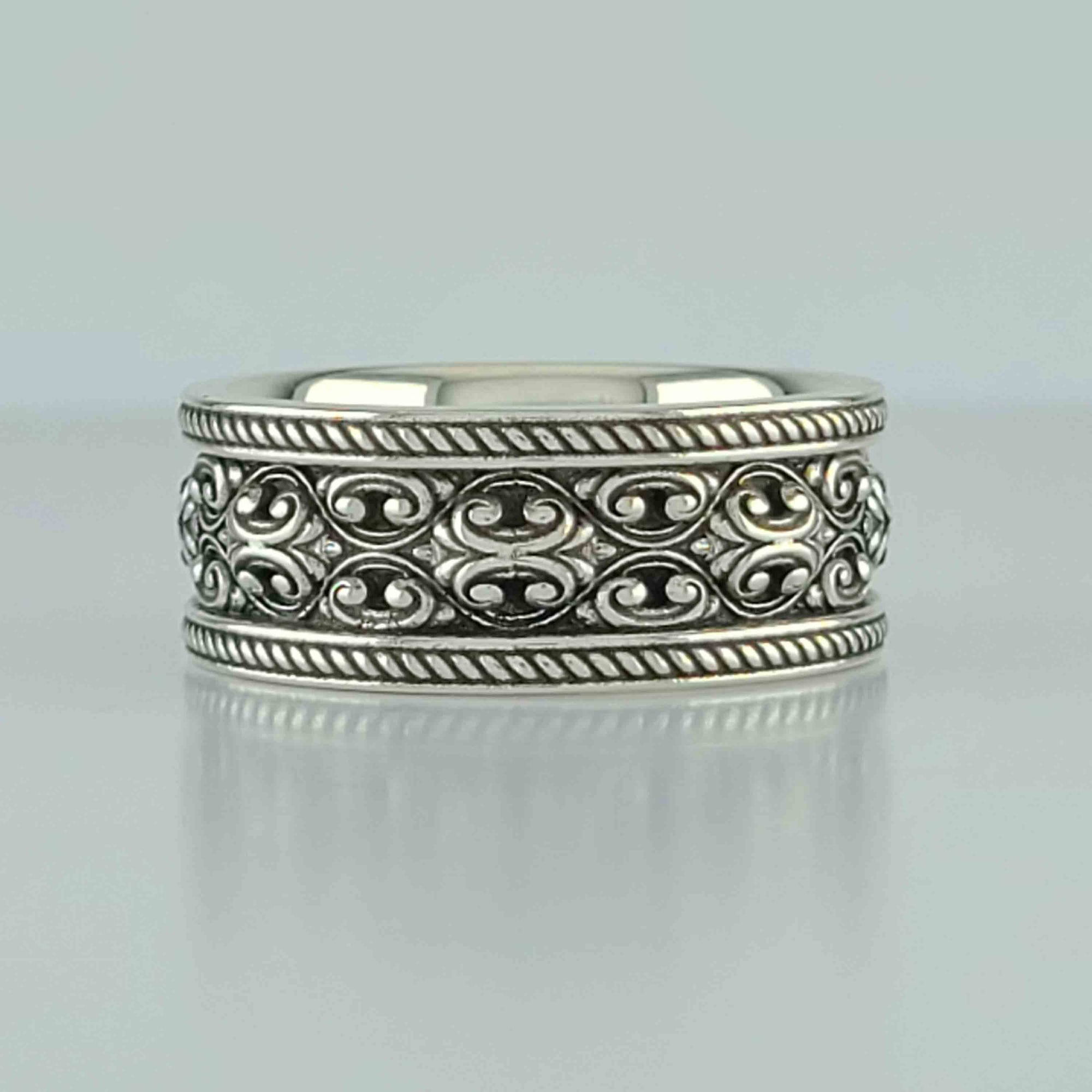 QUATRE CARRERES - ELEGANT SCROLL WEDDING RING